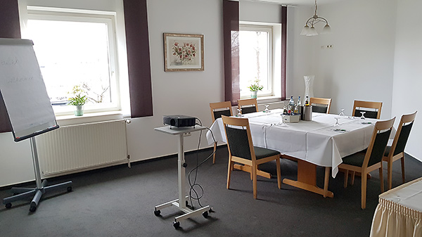 Room Council room, tables in block with FlipChart